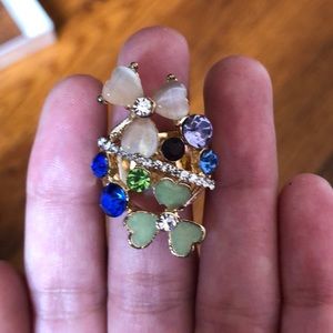 Colorful flowery golden ring with diamonds